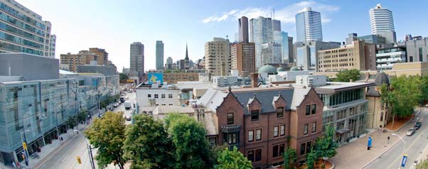 Campus wide shot with city background